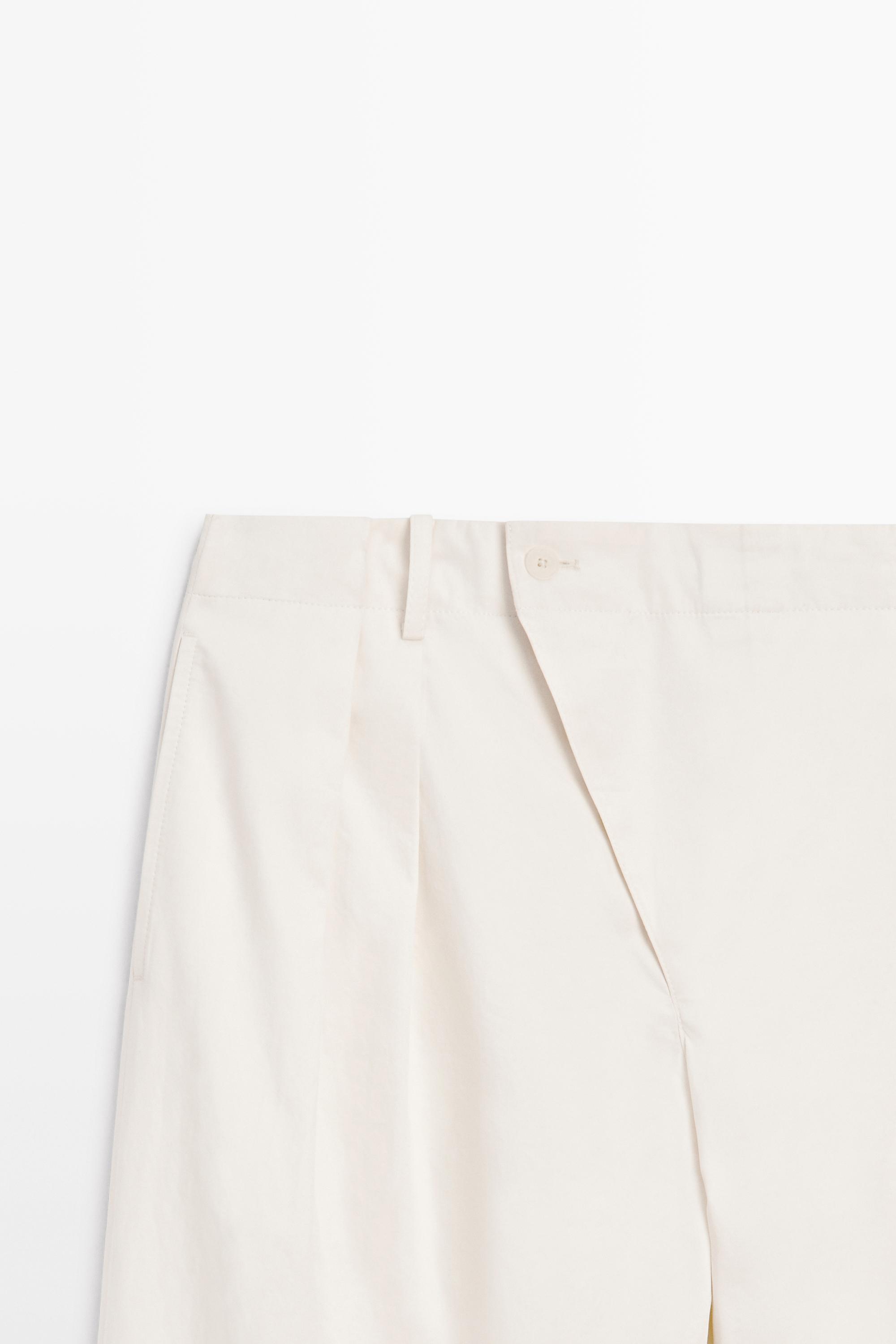 Pleated trousers with crossover fastening - STUDIO